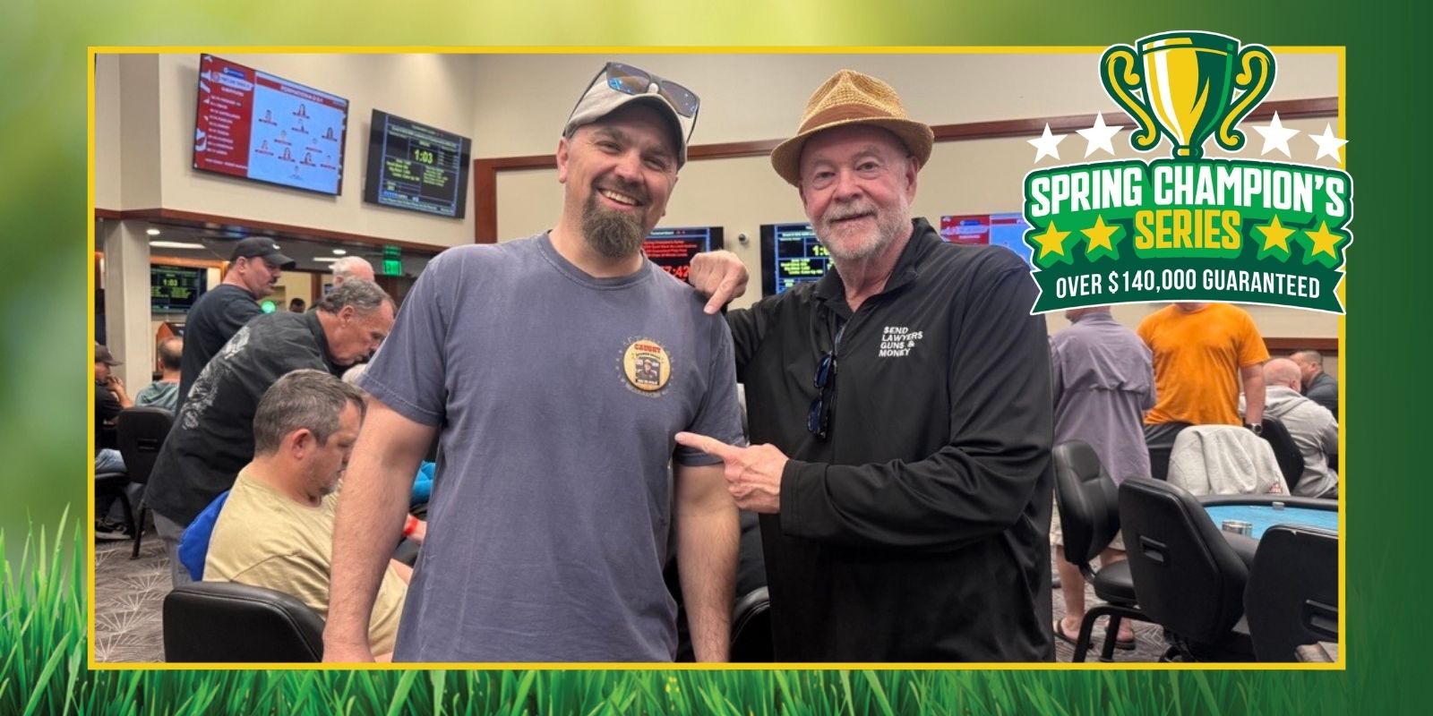 Two men posing at poker event