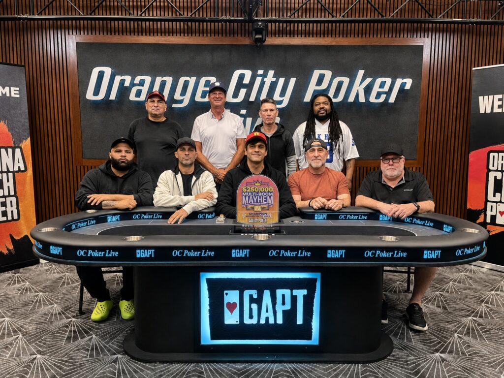 Poker players at tournament table